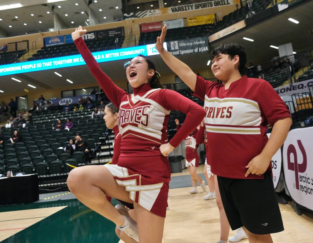 Mt. Edgecumbe cheerleaders provide some spirit during the Braves 81-73 win over the Whalers in the 3A boys 3rd/5th-place game Saturday at 2025 ASAA March Madness Alaska 3A/4A Basketball State Championships in Anchorages Alaska Airlines Center. (Klas Stolpe / Juneau Empire)