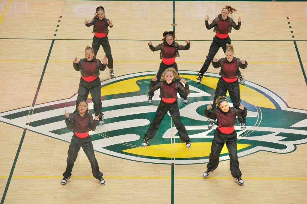Members of the Juneau-Douglas High School: Yadaa.at Kalé dance team perform their Hip Hop routine Friday at the 2025 ASAA March Madness Alaska 3A/4A Basketball State Championships in Anchorages Alaska Airlines Center. (Klas Stolpe / Juneau Empire)