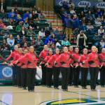 The Juneau-Douglas High School: Yadaa.at Kalé dance team performs their Military March routine Friday at the 2025 ASAA March Madness Alaska 3A/4A Basketball State Championships in Anchorages Alaska Airlines Center. (Klas Stolpe / Juneau Empire)