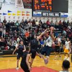 Angoons Clayton Edwin takes a jump shot against Hydaburg during a B bracket game at the 76th Juneau Lions Club Gold Medal Basketball Tournament on Sunday, March 23, 2025, at Juneau-Douglas High School: Yadaa.at Kalé. (Mark Sabbatini / Juneau Empire)