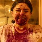 Casey Powers grins after the throwing of colors during Juneaus fourth annual Holi festival on Monday, March 24, 2025. (Jasz Garrett / Juneau Empire)