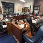 Members of the House State Affairs Committee discuss voting-related legislation with state Division of Elections Director Carol Beecher (left) on Tuesday at the Alaska State Capitol. (Mark Sabbatini / Juneau Empire)