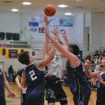 Ketchikans Clayton Olmstead (2) puts up a last second shot among Klawock defenders Nate Yockey (5), Emett Fairbanks (2) Tyler Coleman and Trae Marvin (11) to win a B Bracket elimination game 89-87 Tuesday at the 76th Annual Juneau Lions Club Gold Medal Basketball Tournament in Juneau-Douglas High School: Yadaa.at Kalés George Houston Gymnasium. (Klas Stolpe / Juneau Empire)