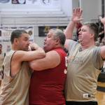 Kakes Robert Jackson secures a ball under pressure from Metlakatlas Tom Brendible and Danny Marsden during Kakes 62-48 Masters Bracket win Tuesday at the 76th Annual Juneau Lions Club Gold Medal Basketball Tournament in Juneau-Douglas High School: Yadaa.at Kalés George Houston Gymnasium. (Klas Stolpe / Juneau Empire)