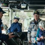 Juneau residents tour the U.S. Coast Guard Cutter Munros bridge on Tuesday, March 25, 2025. (Jasz Garrett / Juneau Empire)