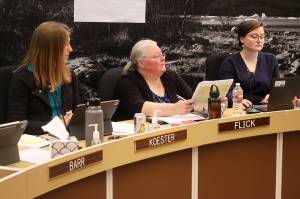 Angie Flick (center), finance director for the City and Borough of Juneau, explains to Assembly members the financial impacts of various adjustments to the mill rate during a Finance Committee meeting on Wednesday, May 22, 2024. (Mark Sabbatini / Juneau Empire file photo)