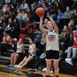Craigs Nani Weimer (10) hits a shot past the arc during the Womens Bracket Championship on Saturday at the 76th Annual Juneau Lions Club Gold Medal Basketball Tournament in Juneau-Douglas High School: Yadaa.at Kalés George Houston Gymnasium. (Klas Stolpe / Juneau Empire)