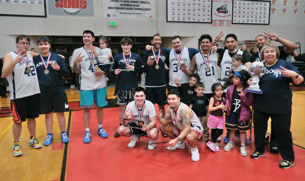 B Bracket champions Angoon pose for a photo Saturday after winning the 76th Annual Gold Medal Basketball Tournament (Klas Stolpe / Juneau Empire)