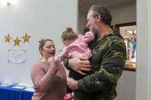Sabrina Donnellan and her family attend a community luncheon for federal employees at Shepherd of the Valley Lutheran Church on Saturday, March 8, 2025. (Jasz Garrett / Juneau Empire file photo)