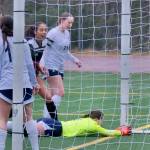 Juneau-Douglas High School: Yadaa.at Kalé freshman Zoe Tagsip watches her shot settle into the back of the Eagle River net during the Crimson Bears 3-0 win over the Wolves on Friday at Adair Kennedy Field. (Klas Stolpe / Juneau Empire)