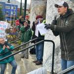 Heidi Drygas, executive director of the Alaska State Employees Association, addresses the crowd during an anti-Trump rally Saturday in front of the Alaska State Capitol. (Mark Sabbatini / Juneau Empire)
