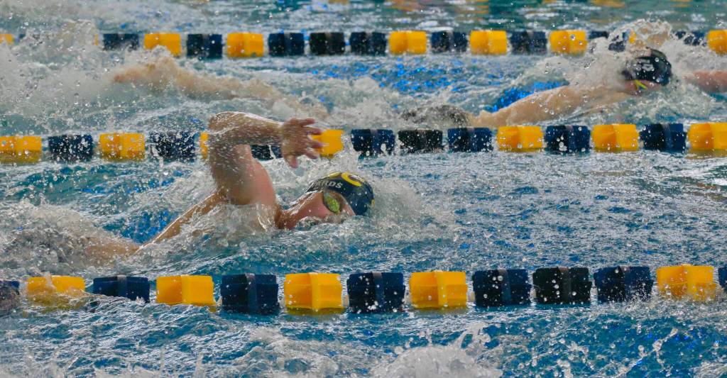 Glacier Swim Clubs Joshua Edwards (16) chases Baranof Barracudas Zach Martens in the 13 and over 200-yard free at the 2025 Savannah Cayce Southeast Age Group Championships on Sunday at the Dimond Park Aquatic Center. Martens placed first and Edwards second. (Klas Stolpe / Juneau Empire)