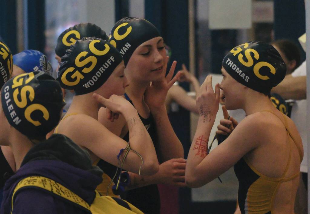Glacier Swim Club swimmers sing alone to Call Me Maybe by Carly Rae Jepsen during the 2025 Savannah Cayce Southeast Age Group Championships on Sunday at the Dimond Park Aquatic Center. (Klas Stolpe / Juneau Empire)