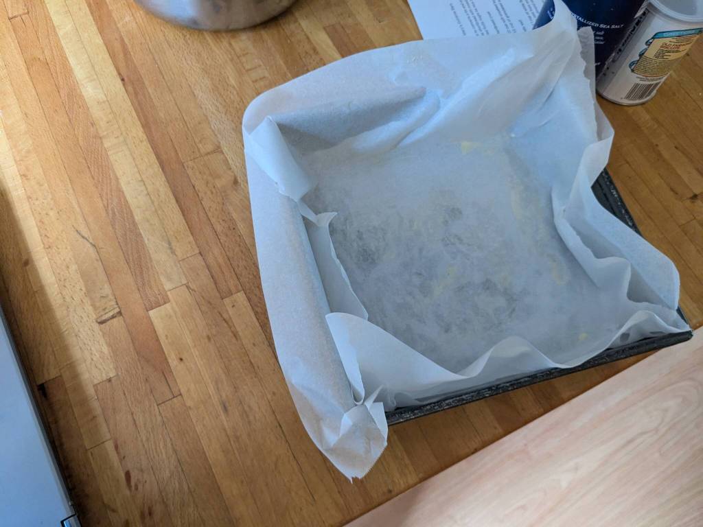 Lining a pan with parchment paper for Marys extreme bars. (Photo by Patty Schied)