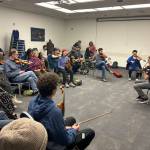 Carter Bancroft leads a fiddle workshop Saturday afternoon at Centennial Hall as part of the weeklong 50th Alaska Folk Festival. (Mark Sabbatini / Juneau Empire)
