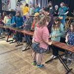 People of all ages participate in a Zimbabwean marimbas workshop Saturday at the Juneau Arts and Culture Center as part of the 50th Alaska Folk Festival. (Mark Sabbatini / Juneau Empire)
