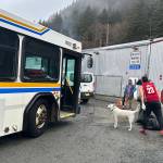 People and one of their pets depart the citys cold-weather emergency shelter in Thane on Wednesday morning, the last day it is scheduled to be open until October. (Mark Sabbatini / Juneau Empire)