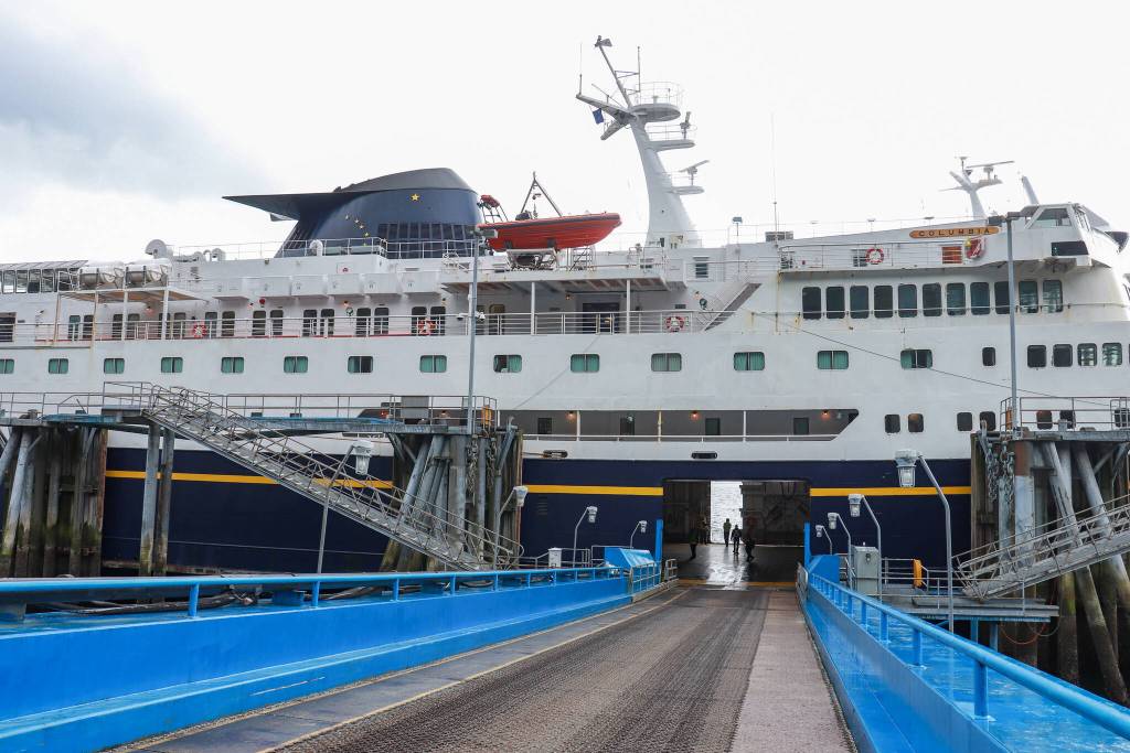 The MV Columbia awaits passengers in Juneau on Tuesday, April 8, 2025. (Jasz Garrett / Juneau Empire)