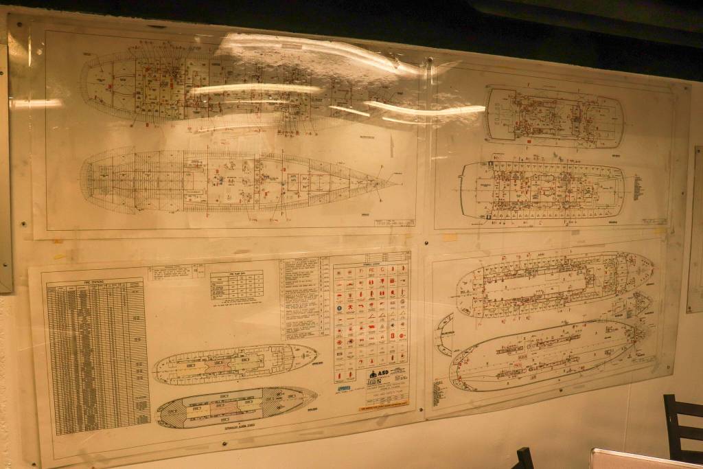 Piping diagrams of the MV Columbia are seen in the ships mess hall. Engineers are expected to understand the piping system and many say they know it like the back of their hand. (Jasz Garrett / Juneau Empire)