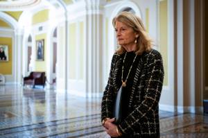 Sen. Lisa Murkowski (R-Alaska) walks out of the Senate chamber on Capitol Hill in Washington, Feb. 20, 2025. Murkowski, who has routinely broken with her party to criticize President Donald Trump, has made a startling admission about the reality of serving in public office at a time when an unbound leader in the Oval Office is bent on retribution against his political foes. (Haiyun Jiang / The New York Times)