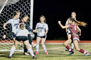 Juneau-Douglas High School: Yadaa.at Kalés keeper and defense blocks the shot by Ketchikans Mary Jane Jasper during the Crimson Bears junior varsity teams 8-0 loss to the Ketchikan varsity at Esther Shea Field on Thursday. (Photo by Christopher Mullen/ Ketchikan Daily News)