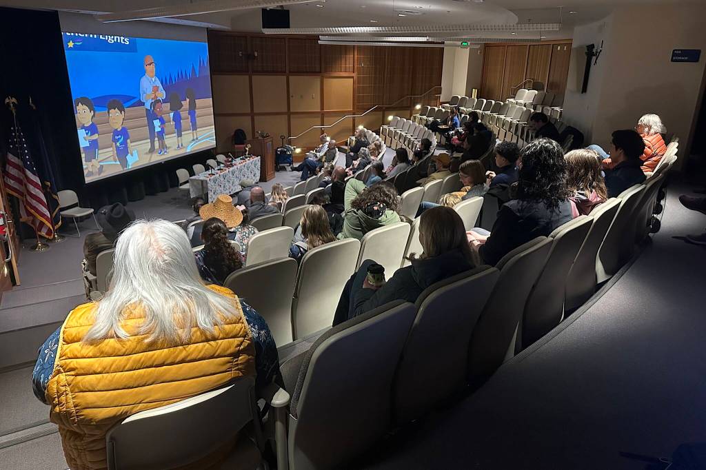 People watch the Emmy-winning Not A Mascot episode of the PBS animated childrens show Molly of Denali during a gathering to celebrate the award Saturday at the University of Alaska Southeast. (Mark Sabbatini / Juneau Empire)