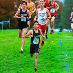 University of Alaska Anchorage freshman Edgar Vera-Alvarado (143) runs in the 2024 GNAC XC Championships on Oct. 26, 2024 at the Sudden Valley Golf Course in Bellingham, Washington. Freshman teammate Anthony Porter (138) from Colorado Springs, Colorado, runs behind. (Photo courtesy UAA)