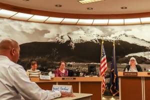 Russell Benford, representative for Royal Caribbean Group, answers questions from Mayor Beth Weldon on Thursday, April 24, 2025. (Jasz Garrett / Juneau Empire)