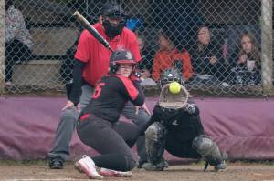 Juneau-Douglas High School: Yadaa.at Kalé batter Cassie Chenoweth eyes a pitch against Lathrop during the Crimson Bears 6-3 win over the Malemutes on Friday at Melvin Park. (Klas Stolpe / Juneau Empire)