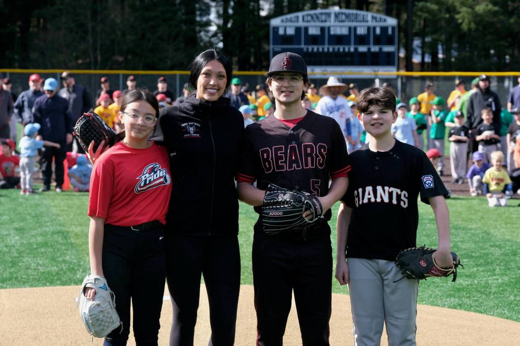 Harper Yadao, Kiah Yadao, Jacob Katasse and Parker Katasse  great grandchildren of Adair Kennedy Memorial Park namesake Richard Adair  were the ceremonial first pitch softball and baseball dignitaries during Saturdays GCLL Opening Day, and field grand reopening and rededication at Adair Kennedy Memorial Park. (Klas Stolpe / Juneau Empire)