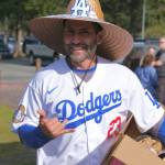 A Gastineau Channel Little League fan attends Saturdays Opening Day, and field grand reopening and rededication at Adair Kennedy Memorial Park. (Klas Stolpe / Juneau Empire)