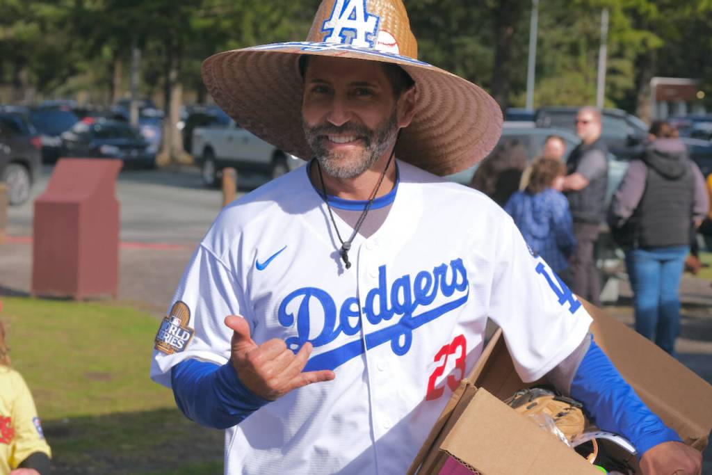 A Gastineau Channel Little League fan attends Saturdays Opening Day, and field grand reopening and rededication at Adair Kennedy Memorial Park. (Klas Stolpe / Juneau Empire)