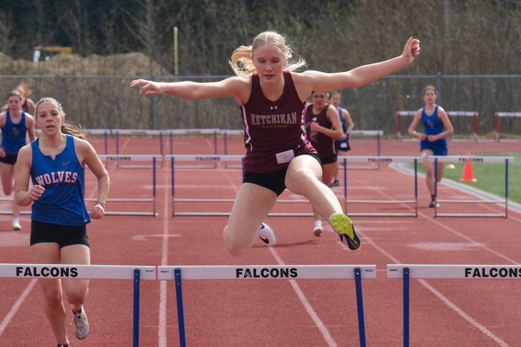 Ketchikan senior Clara Odden wins the girls 300 hurdles in 48.56 with Sitka junior Natalie Hall second in 49.28 during Saturdays Capital City Invitational Track and Field meet at Juneaus Thunder Mountain Middle School field. (Klas Stolpe / Juneau Empire)
