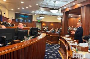 Senate Minority Leader Mike Shower (R-Wasilla), right, explains why he is changing his vote on a compromise education bill during Wednesdays floor session at the Alaska State Capitol. (Mark Sabbatini / Juneau Empire)