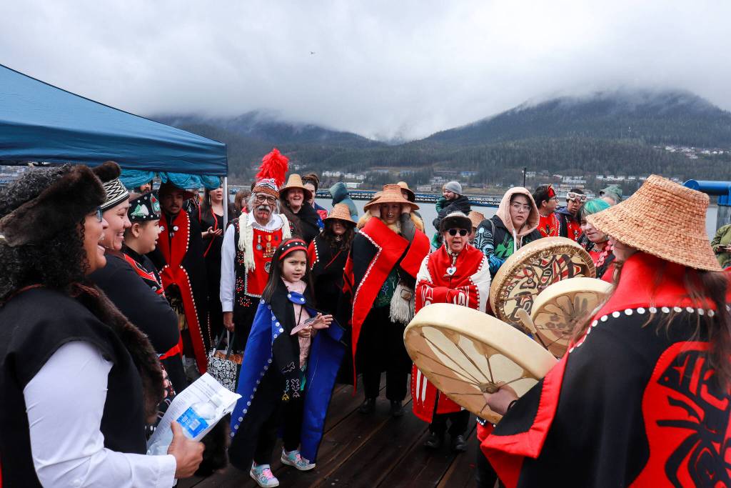 The Yées Ḵu.oo dancers prepare for their opening performance of the Juneau Maritime Festival on Saturday, May 3, 2025. (Jasz Garrett / Juneau Empire)