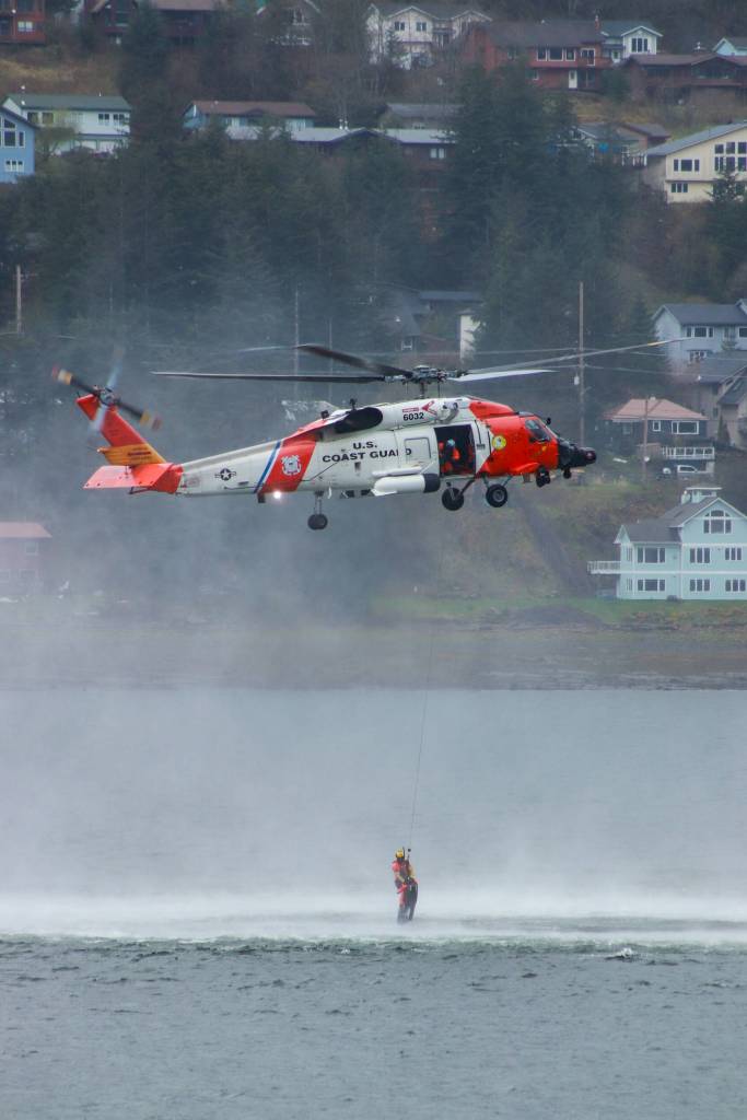 The U.S. Coast Guard demonstrates a search-and-rescue during the Juneau Maritime Festival on Saturday, May 3, 2025. (Jasz Garrett / Juneau Empire)