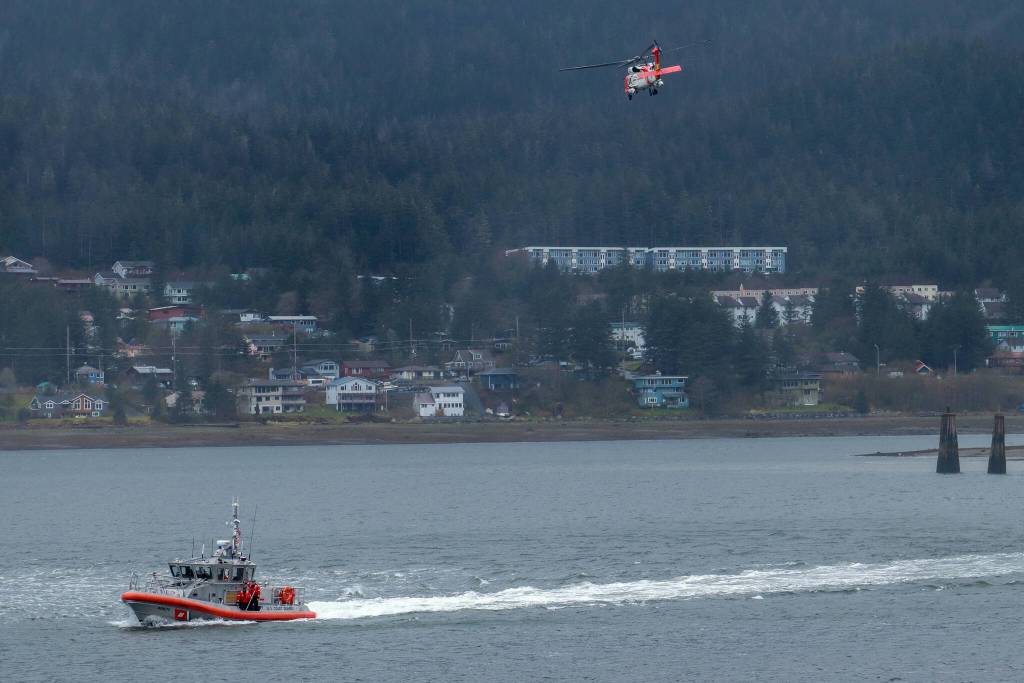 A U.S. Coast Guard Station Juneau response boat retrieves the dummy after the successful search-and-rescue demonstration on Saturday, May 3, 2025. (Jasz Garrett / Juneau Empire)