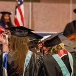 University of Alaska Southeast graduates move their tassels to the left side of their cap on Sunday, May 4, 2025. (Jasz Garrett / Juneau Empire)