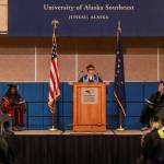 Selah Judge, who graduated with a Bachelor of Arts in social sciences, gives the student speech at the University of Alaska Southeast commencement on Sunday, May 4, 2025. (Jasz Garrett / Juneau Empire)