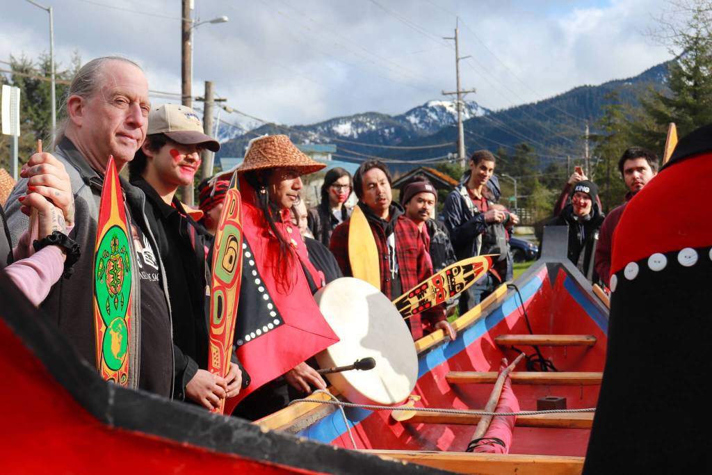 Men carry Wayne Prices dugout canoe, Jibba, to a Missing and Murdered Indigenous Persons Remembrance Ceremony at Twin Lakes in a show of solidarity on Monday, May 5, 2025. (Jasz Garrett / Juneau Empire)