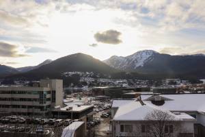 A few clouds disrupt the sunlight in downtown Juneau on an otherwise bright day. (Jasz Garrett / Juneau Empire file photo)