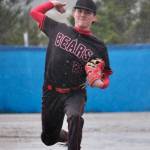 Juneau-Douglas High School: Yadaa.at Kalé senior Christian Nelson (20) pitches during the Crimson Bears 12-7 win over the Petersburg Vikings on Friday at Mort Fryer Ball Park in Petersburg. (Klas Stolpe / Juneau Empire)