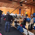 Axel Baumann films and Max Osadchenko captures sounds of Juneau Alaska Music Matters students performing a Gratitude concert at the Sealaska Heritage Institute Clan House on Thursday, May 8, 2025. The event was a wrapup performance after the film crew followed JAMM participants for two weeks as part of a feature-length documentary. (Mark Sabbatini / Juneau Empire)