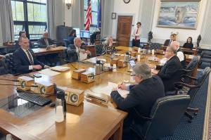 The six members of a joint House-Senate conference committee appointed to resolve differences in their versions of next years proposed state budget sign documents at their initial meeting Tuesday, May 13, 2025, at the Alaska State Capitol. (Mark Sabbatini / Juneau Empire)