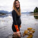 Storytelling catalyst Bethany Sonsini Goodrich takes a cold-water dip in Sitka Sound. The theme of the second edition of Woven magazine focuses on water as a common thread in the lives of Southeast Alaskans. (Photo by Shaelene Grace Mole)
