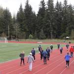 Runners set out on the first stretch of track at Thunder Mountain Middle School during the annual Alaska Law Enforcement Torch Run on Saturday, May 17, 2025. (Ellie Ruel / Juneau Empire)