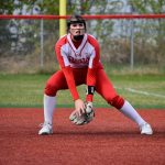 Juneau-Douglas High School: Yadaa.at Kalé senior Taiya Bentz readies for action at first base against Wasilla during the Crimson Bears 13-7 win over the Warriors on Saturday at Wasilla. (Photo courtesy JDHS softball)