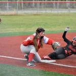 Juneau-Douglas High School: Yadaa.at Kalé sophomore Taylor Petrie slides into third base against Wasilla during the Crimson Bears 18-0 win over the Warriors on Friday at Wasilla. (Photo courtesy JDHS softball)