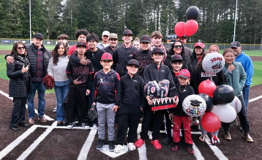 Juneau-Douglas High School: Yadaa.at Kalé senior Christian Nelson and family and friends are honored during the Crimson Bears’ baseball senior night against Ketchikan on Saturday at Adair-Kennedy Memorial Park. (Klas Stolpe / Juneau Empire)
