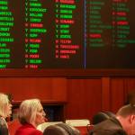 Rep. Andi Story (D-Juneau), Rep. Rebecca Himschoot (I-Sitka), and Rep. Sarah Vance (R-Homer) watch the vote tally during a veto override joint session on an education bill Tuesday, May 20, 2025. (Jasz Garrett / Juneau Empire)